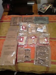 assortment of MRE condiments and cake