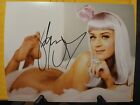 KATY PERRY Signed 8x10 with COA Gorgeous Autograph on Bed