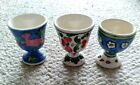Lot of 3 folk art, painted Egg Cups approx 2 1/2