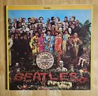New ListingThe Beatles  Sergeant Pepper's  Vinyl LP Record  With Cutout Sheet!