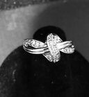 Diamond Knot Ring. Sz 7. Sterling silver setting.