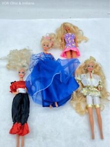 New ListingFour Assorted Bending Knee Barbie Play Dolls W/ Clothing