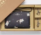 Coach Boxed Corner Zip Wristlet With Snowman Print and Bag Charms- Midnight Blue