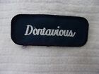 DONTAVIOUS USED EMBROIDERED  SEW ON NAME PATCH TAGS WHITE ON DARK BLUE