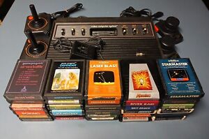 Atari 2600 6-Switch System Bundle w/Console, 30 Games, Joysticks, Paddles & More