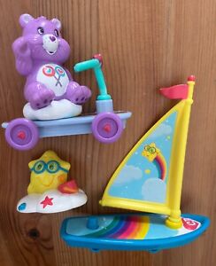 Care Bears Care A Lot Playset: Share Bear on scooter, windsurf board with star