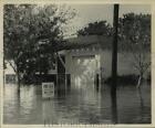 1959 Press Photo Flood waters reach house 