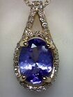 10K Yellow Gold Oval Shape Tanzanite and Diamond 0.15ct twt Pendant with Chain