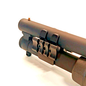 Mossberg maverick 88 12 gauge pump action accessories rail mount magazine tube.