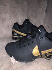 Nike Shox  Suede Shoes- Black & Gold. Woman’s size 8 Or  Men’s Size 7.