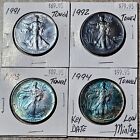 Set of 4 Silver American Eagle Coins BU $1 Monster Toned 1991, 1992, 1993, 1994