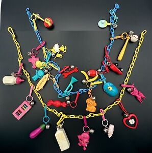 1980's Vintage Plastic Charm Necklaces With 24 Plastic Charms With Bells Snoopy