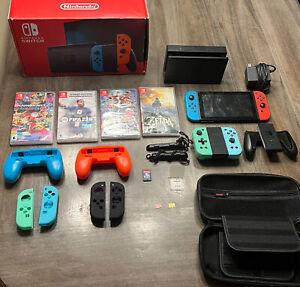 Nintendo  Switch Lot  (Console / 5 Games / 4 Controllers / 2 Memory Chip / Case)