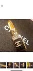 Chanel CC Lipstick Brooch Metal with Resin and Crystals Black, Gold Orange