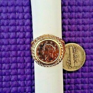 Lustrous 1853 $1 liberty head gold coin in 14 kt gold ring