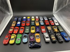 loose lot of 1/64 cars motormax/majorette/maisto/and a mr2 some not mint 41 cars