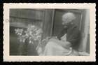 New ListingOLD WOMAN w/WHITE HAIR LOOKING @ HER FLOWERS OLD/VINTAGE PHOTO SNAPSHOT- M298