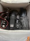 Canon t6i rebel camera w/tripod, microphone, 64gb sd, battery charger, and bag
