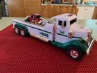 2022 Hess Holiday Truck Flatbed Transporter w/1 Red Hot Rod With Lights & Sounds