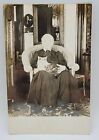 GRANNY CAT ON HER LAP~RPPC~WICKER CHAIR INTERIOR OF HOUSE~PHOTO POSTCARD