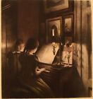 Peter Ilsted: Interior with two girls at the piano. Mezzotint in colours.