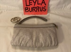 Gucci Ivory leather guccissima wristlet clutch with GG gold charm