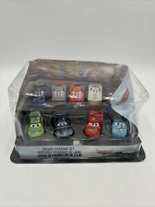 Disney Pixar Cars Deluxe Figurine Play Set Brand New 2021 1/64 WITH APPLE CAR