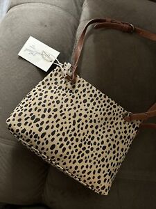 woman animal print handbags