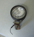 Vintage tractor light Peterson Mfg Co No 507 with some bracket parts
