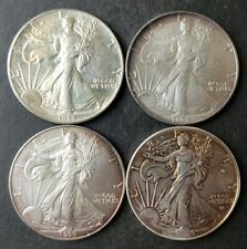 1989, 1992, 1999, and 2022 $1 American Silver Eagle Dollars