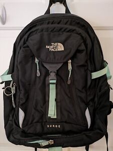 The North Face Surge Backpack Black with mint green accents