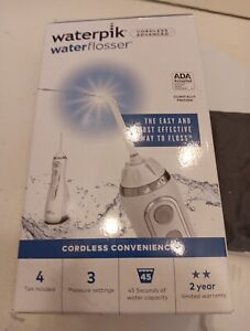 Waterpik WP-560 Cordless Advanced Water Flosser New in Opened Box 4 Tips 3 speed