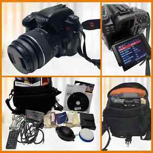 Sony A580 DSLR Camera Bundle: camera, case, cover, manual, cleaning cloth & more