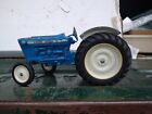 ERTL 1/12 scale FORD 4000 wide front tractor. Played with condition.