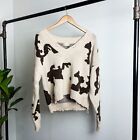 ALTARD STATE | Cow Print Distressed V Neck Knit Sweater