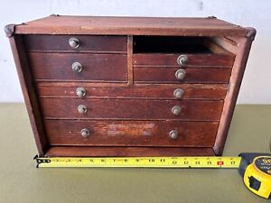 VINTAGE WOOD AND METAL MACHINIST 7 DRAWER. MISSING FRONT FLAP AND 1 DRAWER.