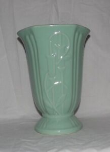 Cattail decorated green pottery vase bottom marked USA