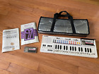 Vintage Casio PT-80 Electric Keyboard w 2 ROM Packs Case Manuals TESTED & WORKS