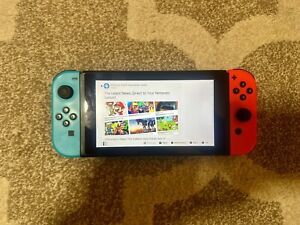 New ListingNintendo Switch w/  Smash Brothers game, Neon Blue Red Joy-Con & case HAC-001-01
