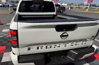Distressed BLACK flag letters fits NISSAN FRONTIER 2022 23 logo tailgate insert