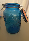 Vintage Blue Glass Jar with Wire Bail & Glass Lid.  Embossed With Blue Hearts.