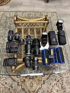 Sony Alpha A77, Alpha A99ii Cameras, eight Lenses, Batteries, Rolling Case +More