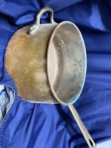 vintage copper pot with brass handle
