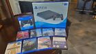 Sony PlayStation 4  1TB Black Console, extra Dualshock controller and 8 games