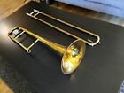 C.G. CONN DIRECTOR. VINTAGE TROMBONE, WIITH CASE AND MOUTHPIECE.