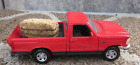 Maisto Red DieCast F-150 Toy Pickup Truck With A Bale Of Hay   1/25 scale