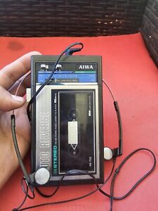 New ListingVintage AIWA Auto Reverse Stereo Cassette Player HS-T20 With Sony Earphones Used
