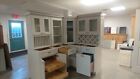 Cabinets-Kitchen Cabinetry-White with all hardware included & softclose.