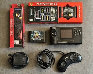 SEGA Genesis NOMAD Console with 2 Games & Extras