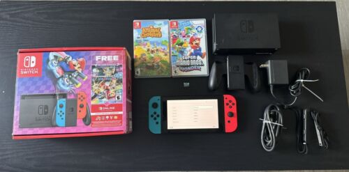 New ListingNintendo Switch Bundle With 128GB MicroSD And Mario Odyssey, Animal Crossing